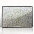 Framed acrylic artwork showcasing vibrant abstract splatters in black and multicolored hues, ideal for modern home decor, enhancing contemporary aesthetics.