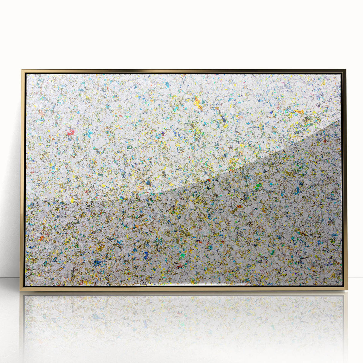 Framed acrylic artwork showcasing an abstract design of colorful splatters in gold, perfect for modern home decor, enhancing artistic appeal and vibrancy.