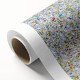Abstract splatter art on rolled canvas showcasing vibrant colors of blue, yellow, and pink, ideal for modern home decor or artistic wall displays, secured in a protective tube.