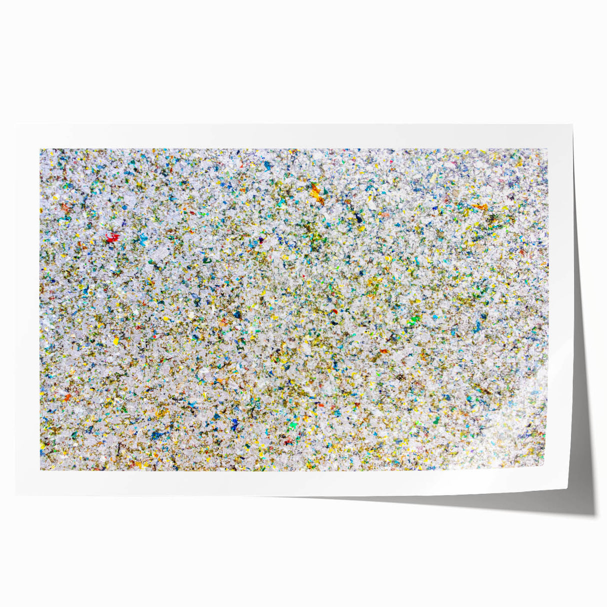 Abstract splatter art print showcasing vibrant colors and dynamic patterns on rolled canvas, ideal for modern home decor or creative spaces, securely packaged in a protective tube.