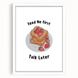 Abstract art print featuring assorted kitchen items in muted earth tones, framed with a white mat.