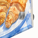 Close-up of large abstract wall art featuring assorted pastries in vibrant colors on acrylic glass.