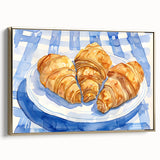Framed canvas depicting a vintage poster of pastries in muted gold and black tones, suitable as wall art for bedroom.