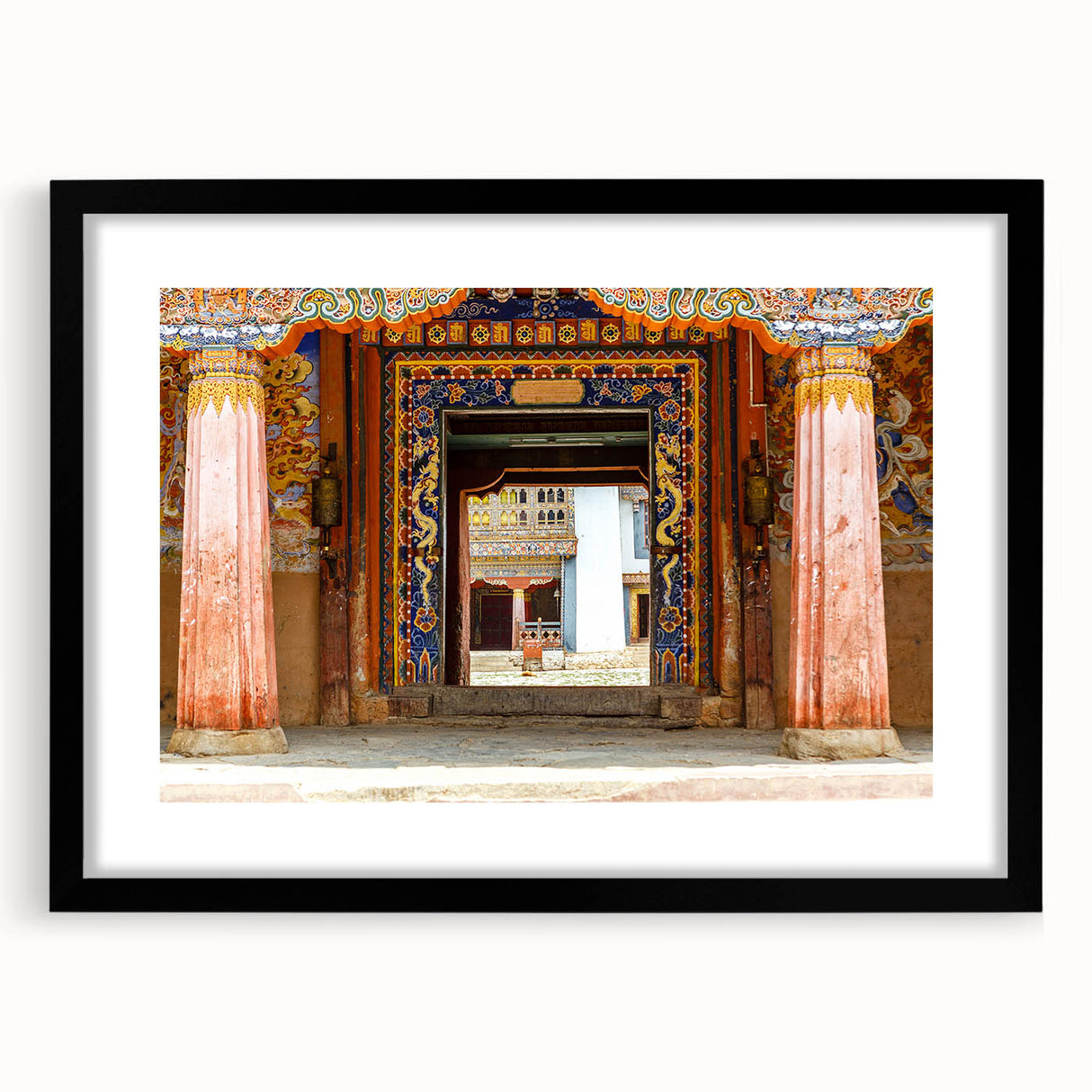 Extra large abstract art print featuring vibrant, colorful Bhutanese scenery on a black framed canvas.