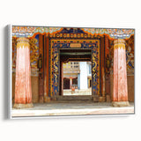 Framed canvas of vintage poster art featuring a Bhutanese landscape in colorful tones, ideal for living room decor.