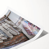 Extra large wall art featuring line art flowers in muted earth tones on a rolled canvas.