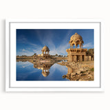 Abstract art print of an Indian scenery in muted earth tones on a white-matted framed poster, suitable for dining room decor.