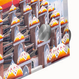 Large abstract wall art depicting an Indonesian landscape in vibrant greens and blues on acrylic glass.