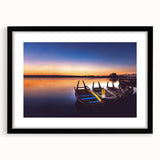 Colorful abstract art print of a textured Asian landscape in vibrant hues, framed in black, ideal for living room decor.