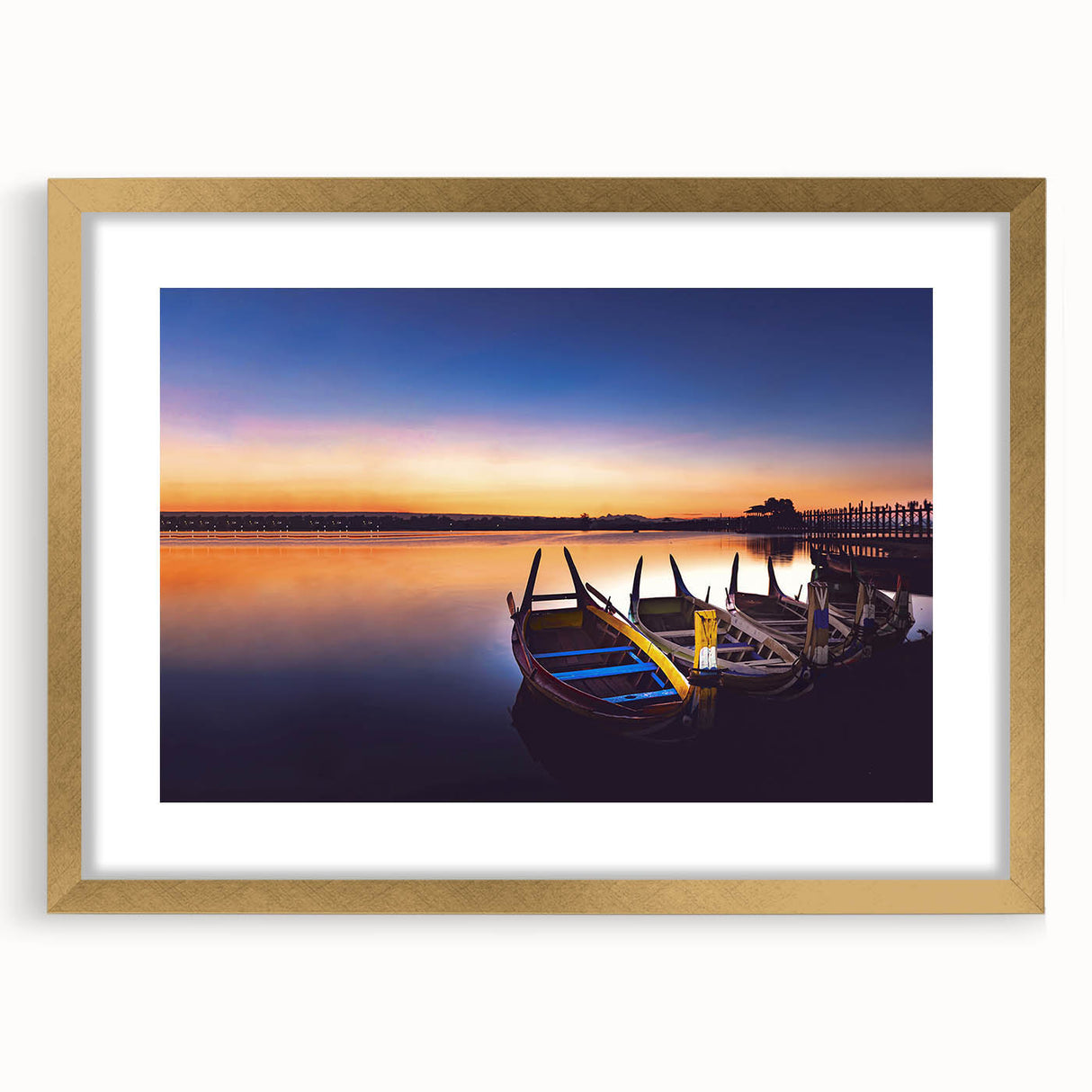 Extra large abstract art print of a Myanmar scenery in gold frame, featuring textured earth tones.
