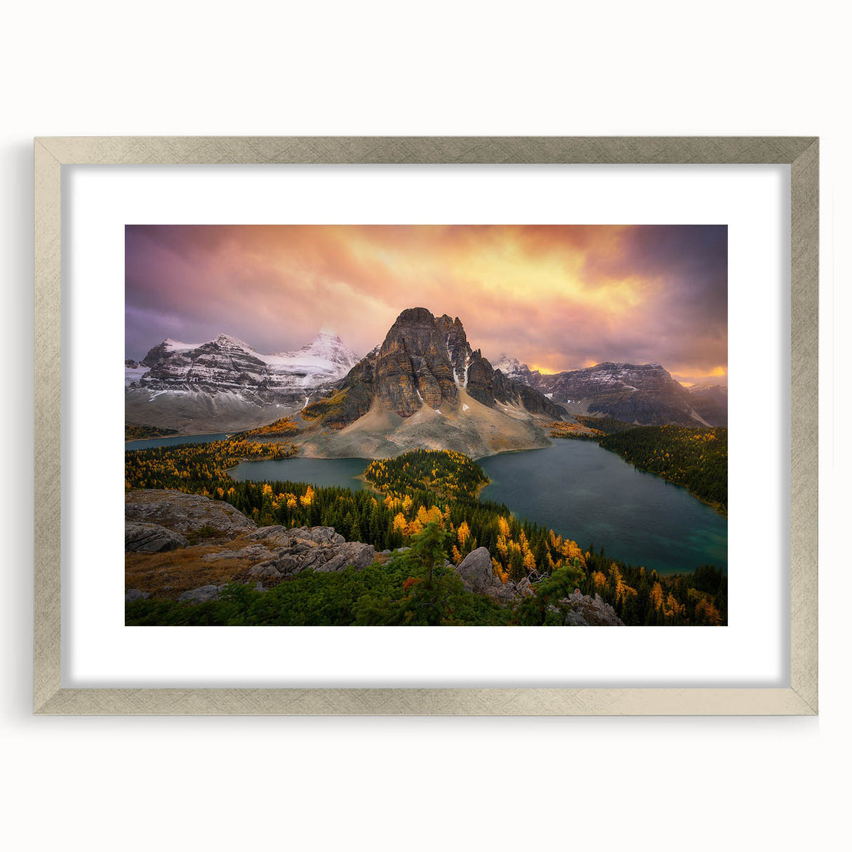Textured abstract art print of British Columbia scenery in muted earth tones, framed in silver, suitable for bedroom decor.