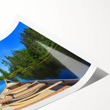 Extra large wall art featuring line art flowers in muted earth tones on a rolled canvas.