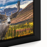 Black wall art depicting a textured Yukon scenery on a framed canvas with vibrant, colorful accents.