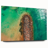 Large abstract wall art of a Caribbean scenery in vibrant blue and green tones on acrylic glass.