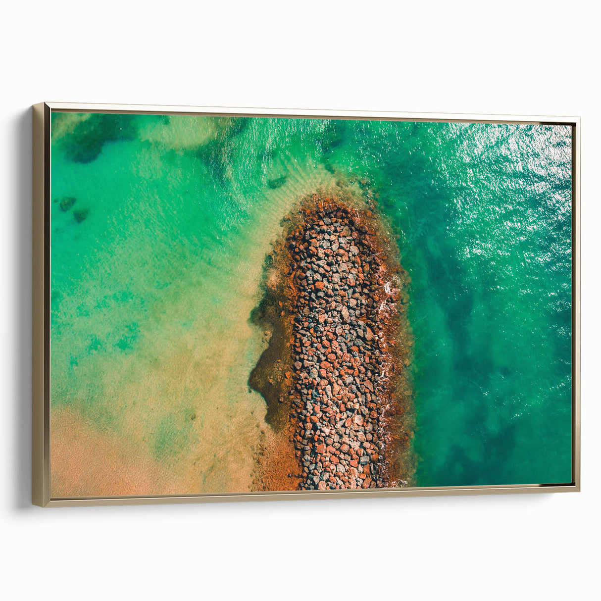 Framed canvas featuring a vintage-style landscape painting of a Caribbean scenery in muted gold and black tones.