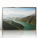 Mid-century modernist art depicting a European Albanian landscape in muted earth tones on a silver-framed acrylic print.