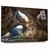 Large abstract wall art of a European scenery in muted blues and greens on acrylic glass.