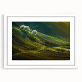 Textured art print of an abstract European cityscape in muted earth tones, framed in white, suitable for bedroom decor.