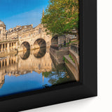 Extra large black wall art featuring a textured depiction of a European scenery in vibrant colors, framed canvas.