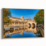 Framed canvas featuring a vintage-style landscape painting of Bath, England in muted gold and black tones.
