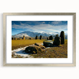 Extra large abstract art print depicting a textured European scenery in muted earth tones, framed in silver.