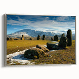 Landscape art painting of Cumbria, England, featuring colorful hills, displayed on a silver-framed canvas.