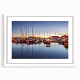 Textured abstract art print of a European landscape in muted greens and blues on a white framed canvas.