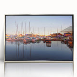 Large art print of a serene Estonian landscape in muted green and blue tones on a silver-framed acrylic.