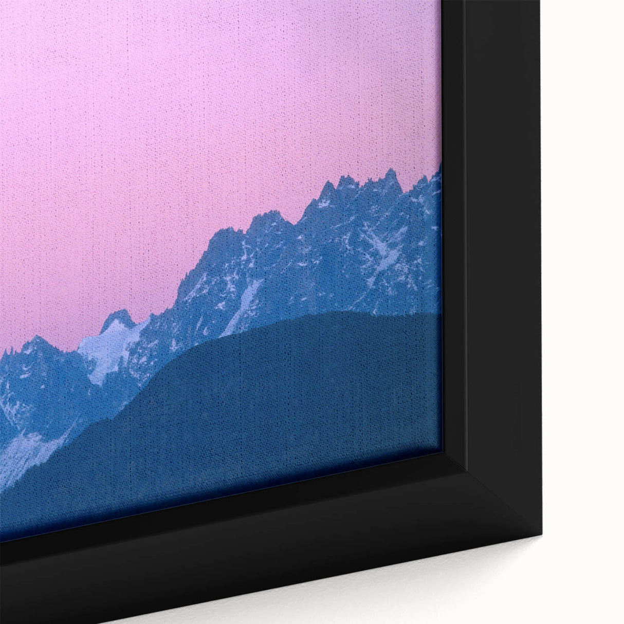 Black wall art featuring a textured depiction of the French Alps in vibrant colors on a large framed canvas.