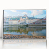 Mid-century modernist art of Lyon, France scenery in muted colors on framed acrylic, suitable for nursery wall decor.