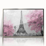 Large art print of Paris scenery with the Eiffel Tower in muted gray tones, framed in silver acrylic.
