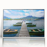 Mid-century modernist art depicting Bavarian scenery in muted green and blue tones on a white framed acrylic print.