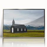 Large art print of a serene Icelandic landscape in muted blue and green tones, framed in silver acrylic.