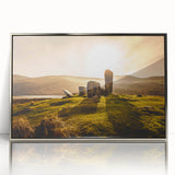 Large art print of a serene Irish landscape in muted green and blue tones, framed in silver acrylic.