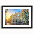 Abstract art print of Florence scenery in vibrant colors on a large textured canvas, framed in black.