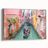 Landscape art painting of Venice with colorful buildings and gondolas on canvas, framed in silver.