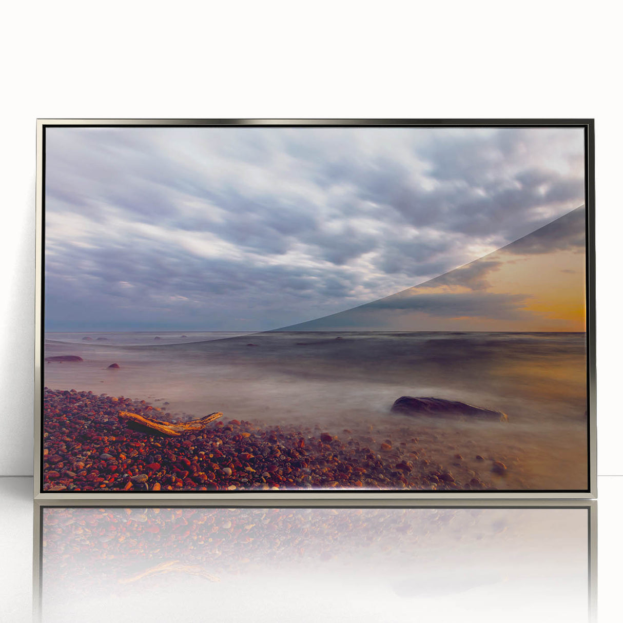 Large art print of a European Lithuanian landscape in muted greens and blues on a silver-framed acrylic.