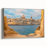 Framed canvas featuring a vintage-style landscape painting of Malta with colorful art and black edges.