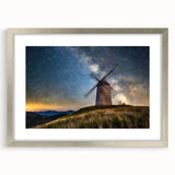 Extra large abstract art print depicting a textured European scenery in muted earth tones, framed in silver.