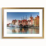 Abstract art print depicting a European scenery in muted earth tones on a framed gold canvas, ideal for dining room decor.