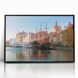 Large abstract wall art depicting a European scenery in muted earth tones on a framed acrylic.