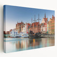 Side view of a stretched canvas depicting a European cityscape in muted earth tones, ideal for kitchen wall art.