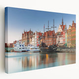 Side view of a stretched canvas depicting a European cityscape in muted earth tones, ideal for kitchen wall art.