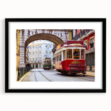 Colorful abstract art print of Lisbon scenery in vibrant hues on a large framed canvas, ideal for living room decor.