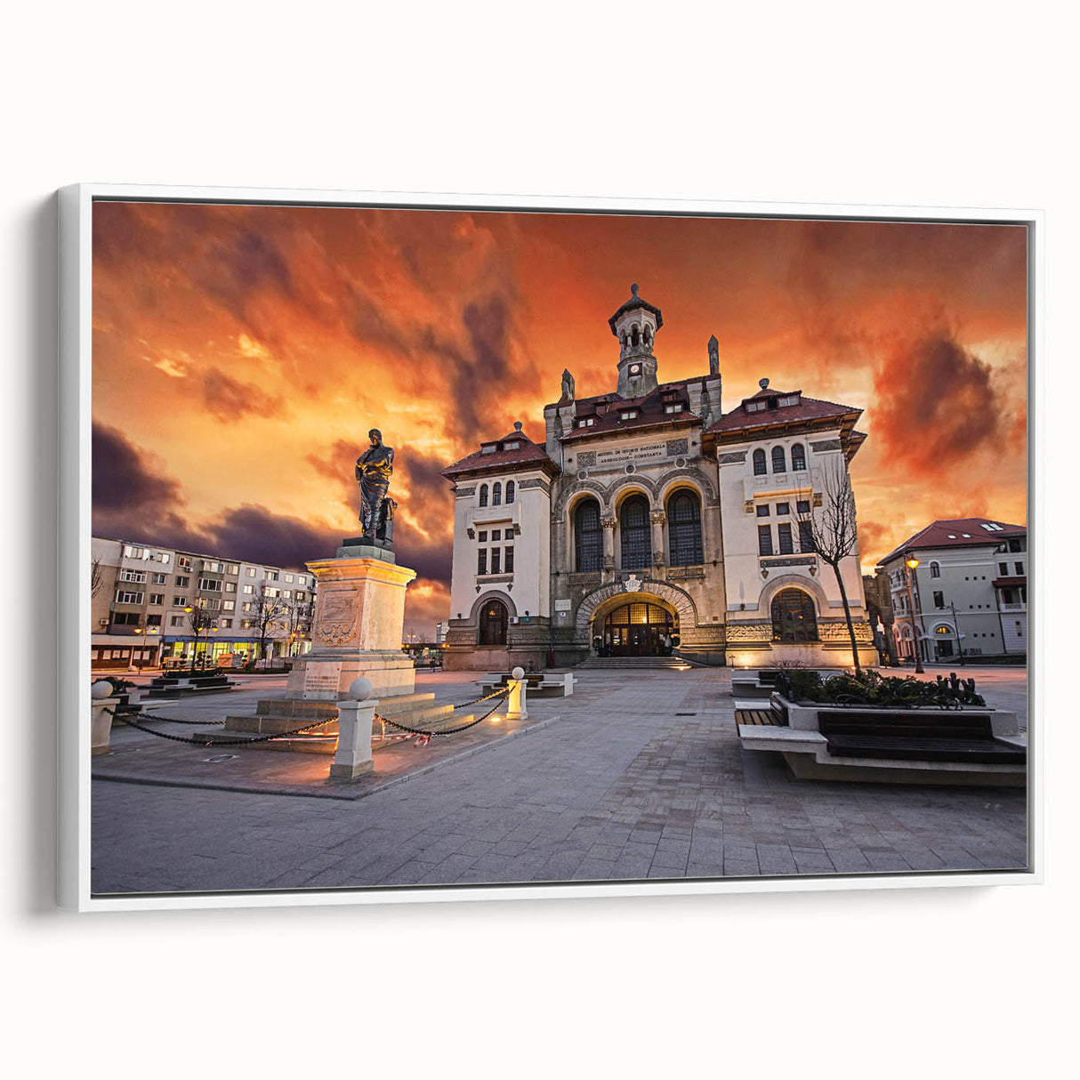 Vintage poster art of a Romanian landscape on framed canvas, featuring colorful imagery against a black background.