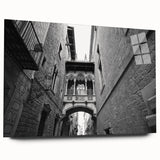 Large abstract wall art depicting the Barcelona skyline in muted blues and grays on acrylic glass.