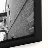 Black wall art featuring a textured depiction of Barcelona scenery in vibrant colors on a framed canvas.