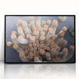 Large abstract wall art depicting a stylized Canary Islands scene, in muted earth tones on a black framed acrylic.