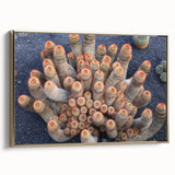 Framed canvas of a vintage-style landscape painting depicting the Canary Islands in Spain, with muted gold and black tones.