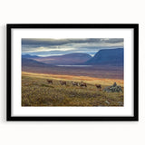 Extra large abstract art print of a textured European scenery in vibrant colors, framed in black.